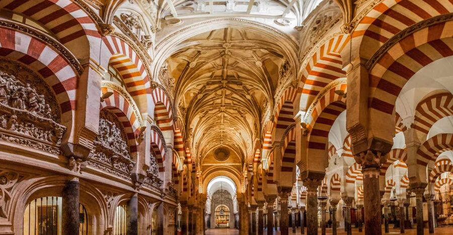 Cities of Andalusia 4-Day Tour from Madrid - Day 2 in Seville: Plaza de España, the Giralda, Santa Cruz, and optional evening choices