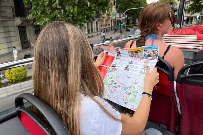City Sightseeing Madrid Panoramic Bus Tour - Included Walking Tours: Gran Via y Los Asturias at 12pm and Royal Palace at 6pm