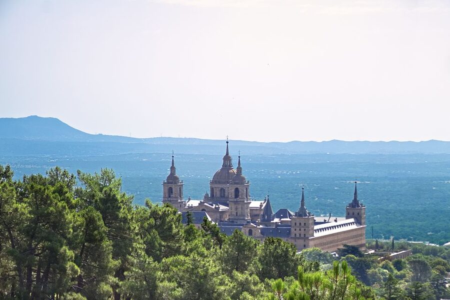 From Madrid: El Escorial and Valley's Basilica Half Day Tour - Palace of Philip II and the royal rooms: power made stone