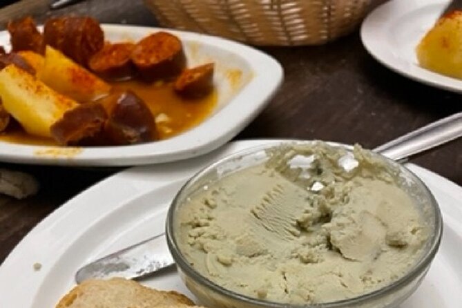 Madrid by Night Small Group Tour: Stories, Sights and Tapas Bites - Four bar stops and a strong regional flavor sweep