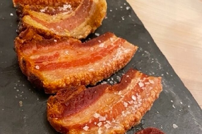 Madrid by Night Small Group Tour: Stories, Sights and Tapas Bites - First bar includes 1 drink and 3 tapas tastings, so you can settle in