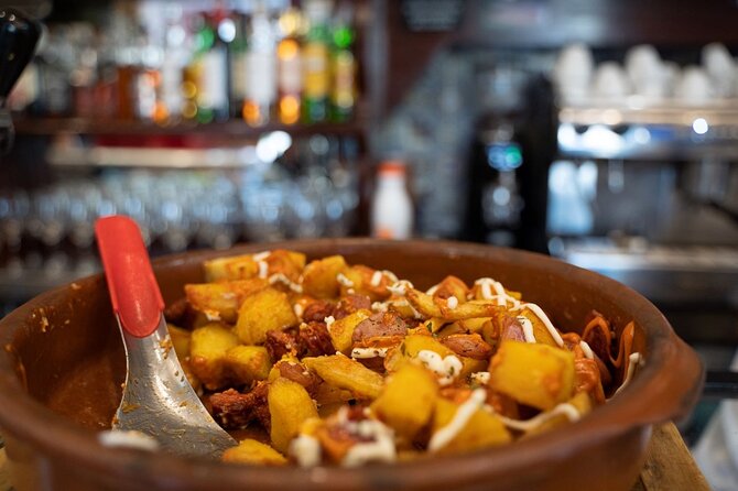 Madrid by Night: Tapas Crawl, Local Drinks & Hidden Gems - Stop-by-stop: markets, taverns, and the classic Madrid crawl