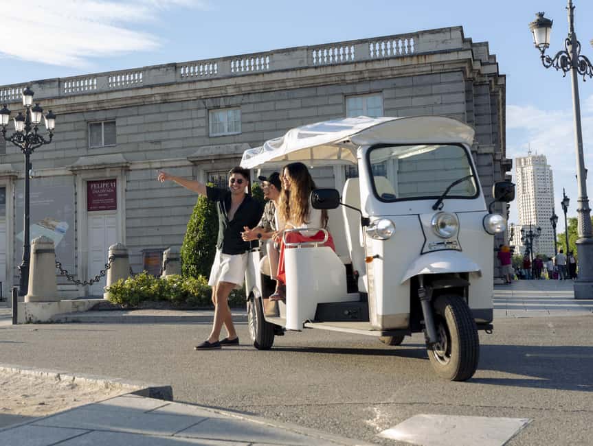 Madrid: Eco-Friendly, Private, and Unique Tuk Tuk Experience - Alcala Gate to luxury hotel exteriors: photo stops with real timing