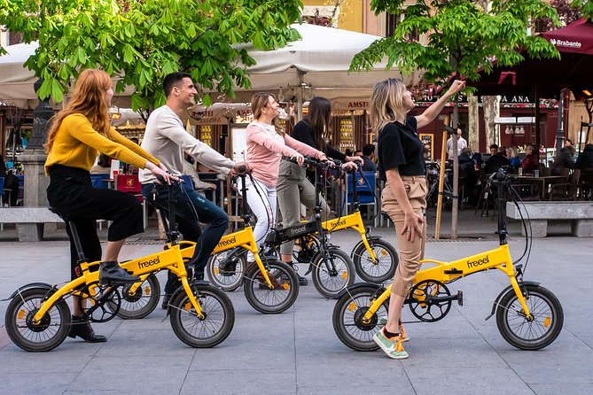Madrid Electric Bike Private Tour: Highlights & Parks - Plaza de España, Royal Palace, and Almudena Cathedral: Royal Madrid, Up Close