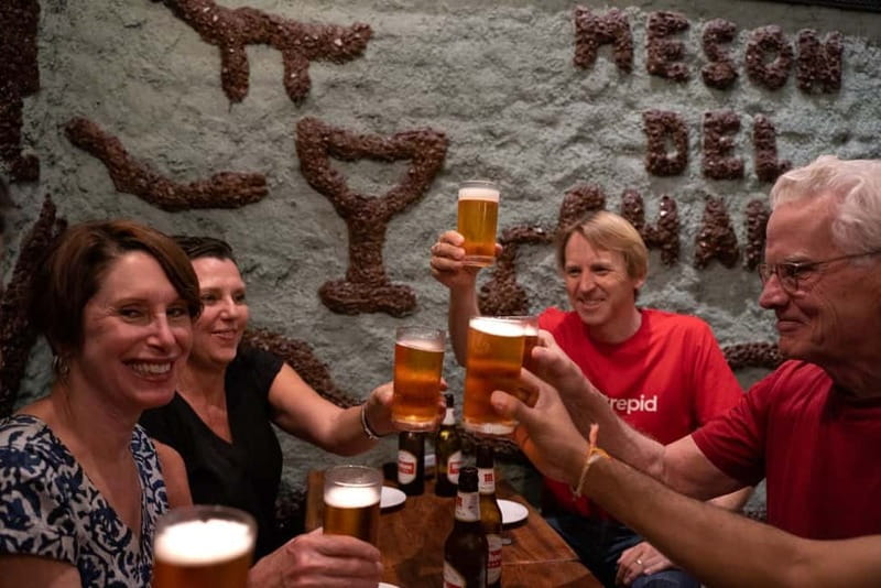 Madrid: Evening Tapas Tour with 5 Delicious Stops & Drinks - Plaza Mayor and the Bocadillo de Calamares Break