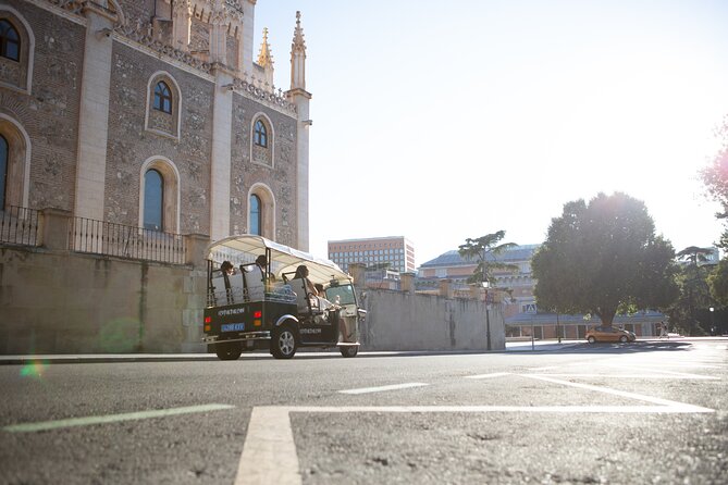 Madrid Express Tour with Local Guide in Eco Tuk Tuk Private - Stop by Stop: Market, Atocha, and the Spanish Courts