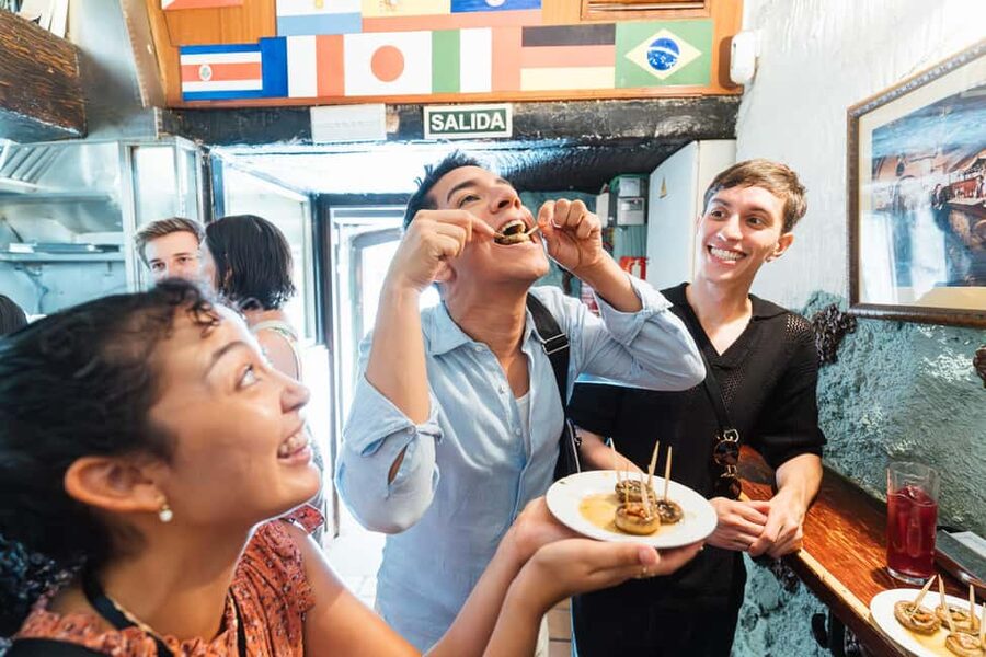 Madrid: Food Walking Tour with Drink and Local Guide - Four tapas tastings at locally owned places