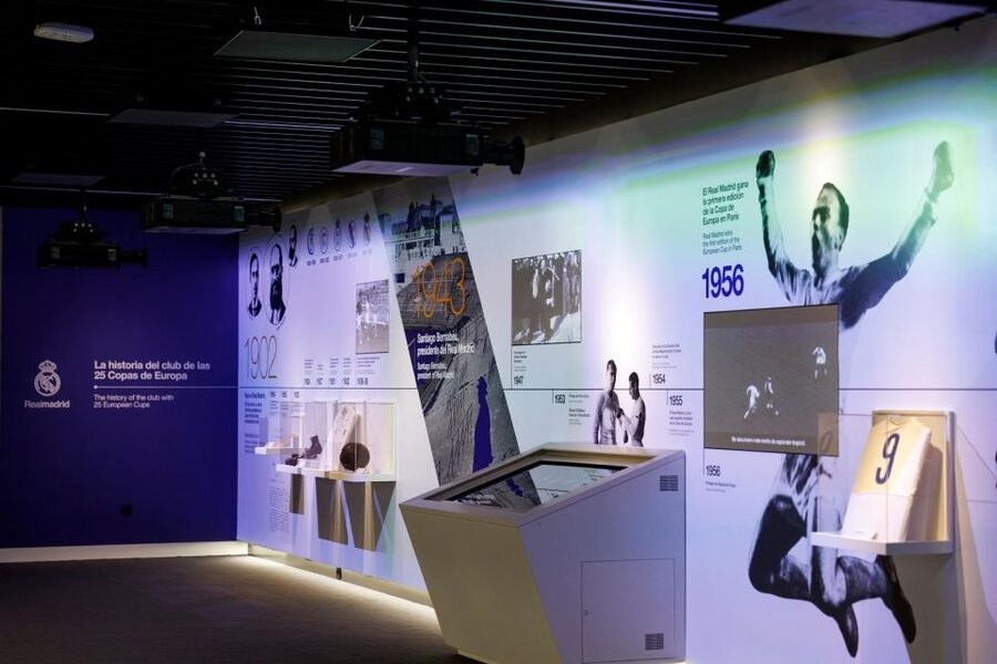 Madrid: Guided Tour of Bernabéu Stadium - Trophy photo moments, trophy cases, and the Real Madrid atmosphere