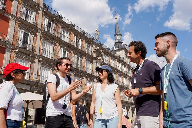 Madrid Highlights Tour with Santiago Bernabeu Stadium Entrance - The Guided Walking Tour: Barrio, Squares, and Why Madrid Looks the Way It Does