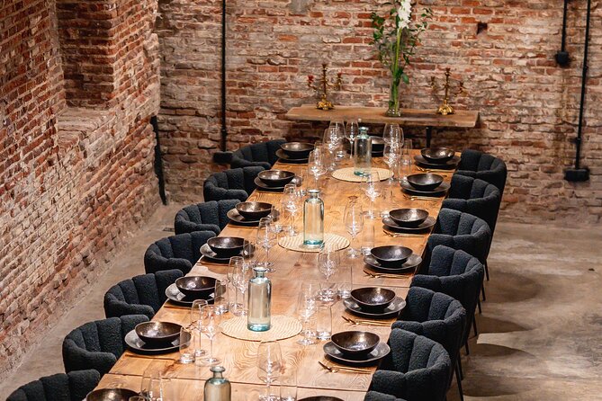 Madrid Local Tapas Tour with Private Dinner and Bottomless Wine - Iberian Ham Tasting at a Former Jamón Museum: Three Types, One Guided Pairing