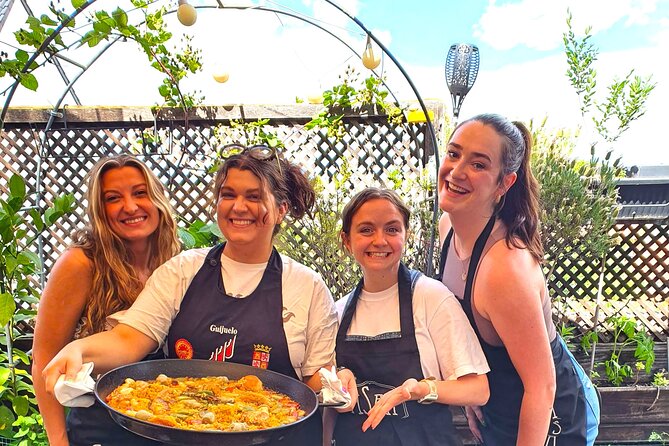 Madrid: Paella & Sangria Classes- Seafood, Chicken & Vegan option - Tapas warm-up: tortilla de patatas and ham toast you’ll want to recreate