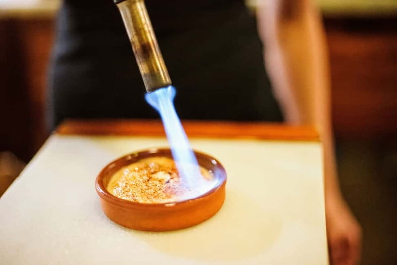 Madrid: Paella & Tapas Cooking Class and Market Visit - Kitchen aperitif time: sweet vermouth and quick tapa learning