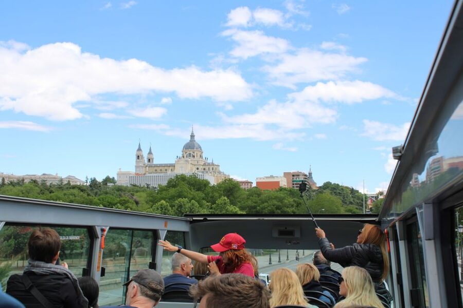 Madrid: Panoramic Open-Top Bus Day or Night Tour with Guide - Plaza de Cibeles, Metropolis Building, and Gran Vía at Night