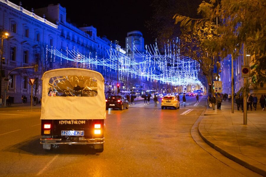 Madrid: Private Christmas Lights Tour by Eco Tuk-Tuk - Alcala Gate to Retiro Park: starting with a wow moment, then easing into the night