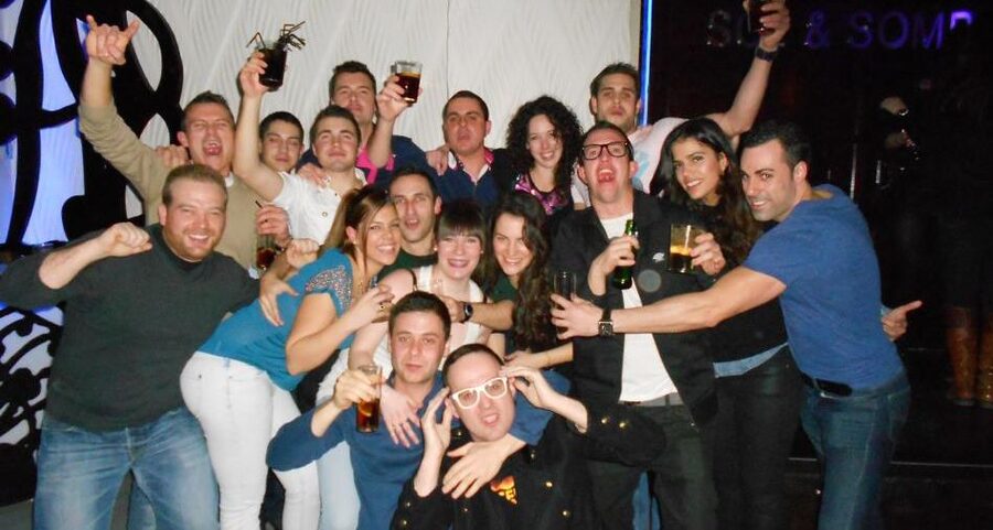 Madrid: Pub Crawl Madrid Running since 2005 Bar Exploration - Puerta del Sol at night, the Bear statue is your anchor point
