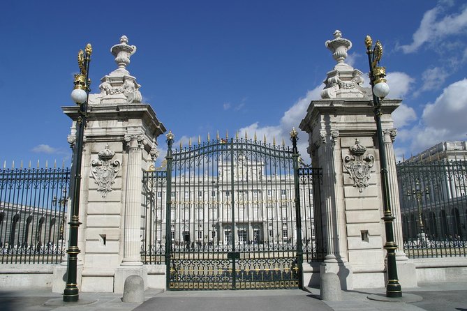 Madrid Sightseeing Tour with Royal Palace Skip the Line Ticket - Gates, Fountains, and Big-City Madrid on the Coach