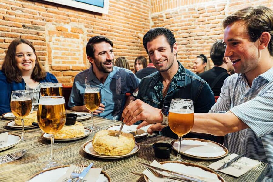Madrid: Tapas Food Tour with Drinks and Food - The neighborhood history makes the eating feel personal