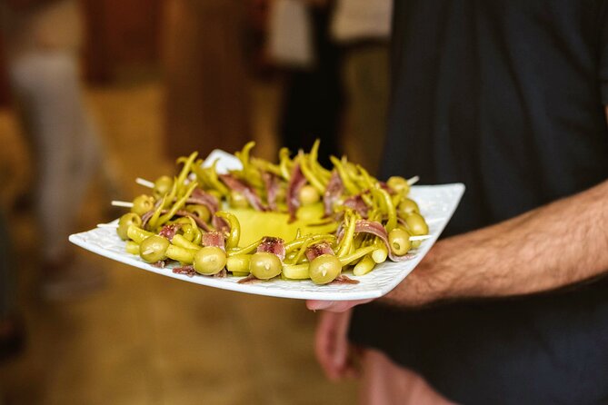 Madrid Tapas & Paella Cooking Experience with Local Market Visit - Lunch, dessert, and the drink pairing that keeps it easy