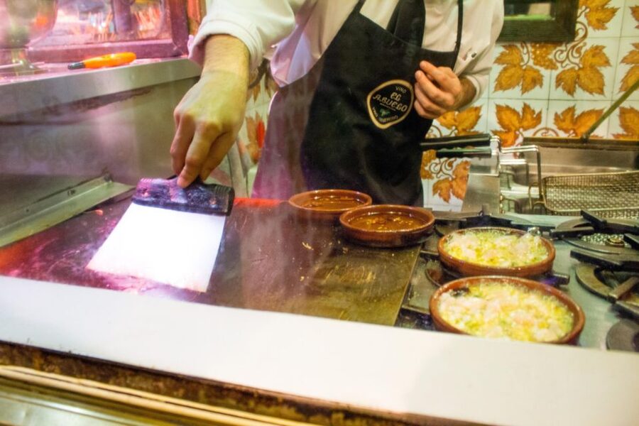 Madrid: Tapas & Wine Tasting Tour with Local Guide - Why the guides matter: history, wine regions, and smart ordering