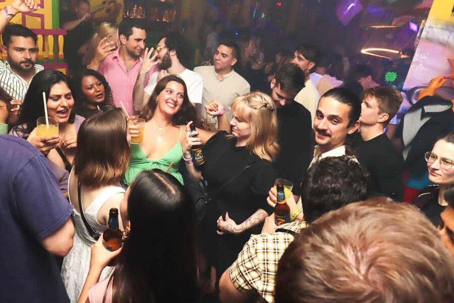 Madrid: Top Pub-Crawl with Drinks and Nightclub Entry - Las Letras Quarter dance show hour: where the group shifts into performance mode