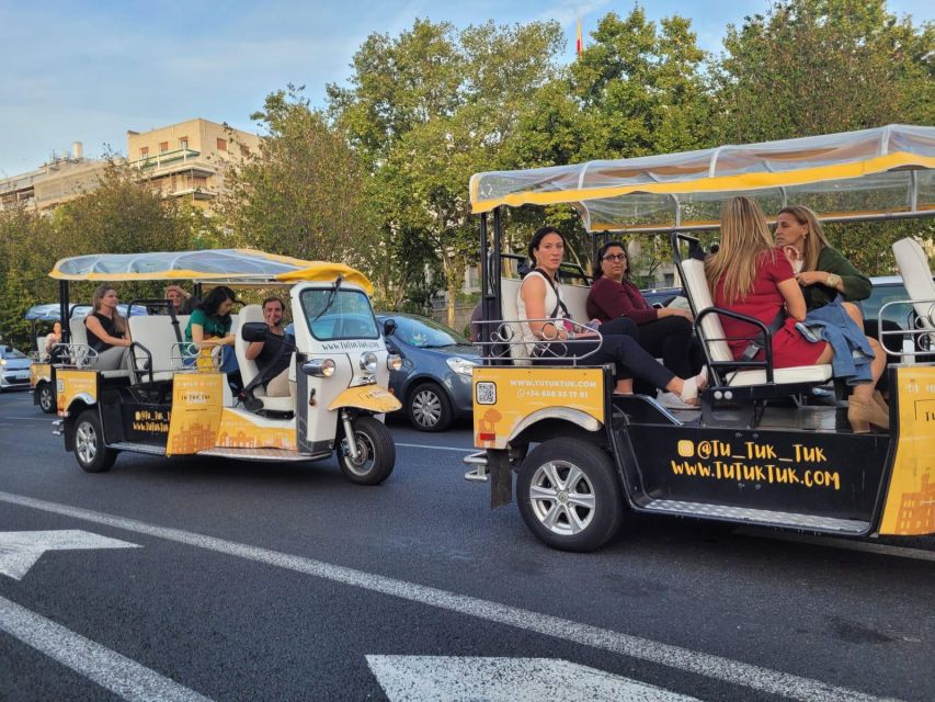 Madrid: Traditional Tour wh Private guide in yellow Tuk Tuk - Calle Alcalá, the Metrópolis building, and Plaza de Santa Ana