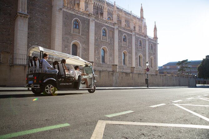 Madrid Welcome Tour with Local Guide in Eco Tuk Tuk Private - Congress and the Spanish Courts, Plus the Fountains of Cibeles and Neptune