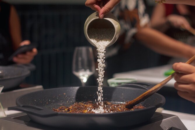 Paella Cooking Class in Madrid with Bottomless Wine Pairing - Bottomless wine pairing: five Spanish wines with your meal