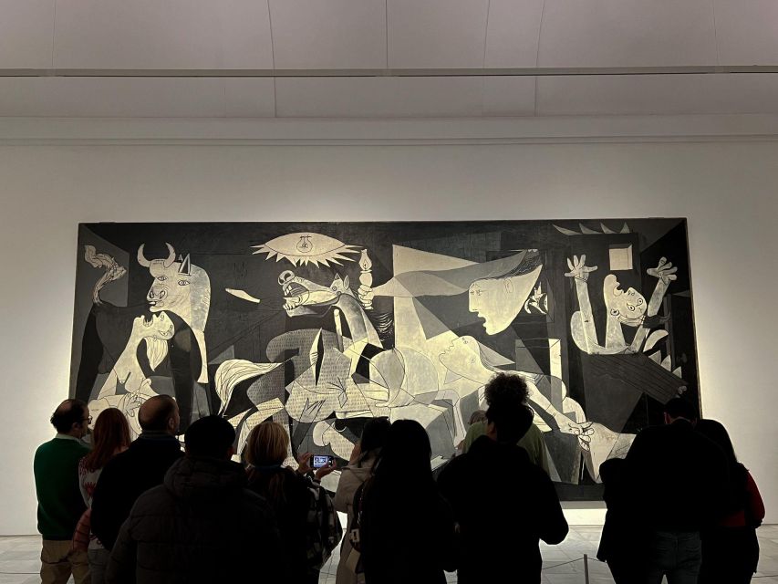 Private Guided tour Afternoon Art Delight at Reina Sofía - Getting started fast: the white umbrella and the main entrance