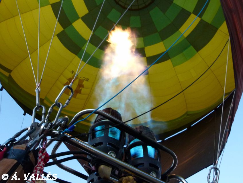 Segovia: Hot Air Balloon Ride with Picnic and Activity Video - The moment you land, then the cava toast and Iberian picnic