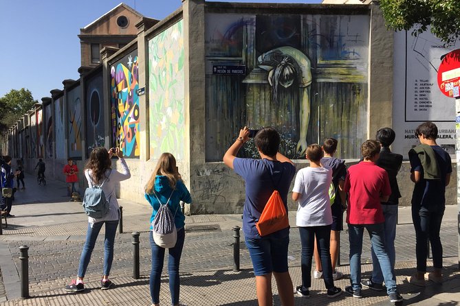 Street Art Guided Tour in Madrid - La Tabacalera de Lavapiés: tobacco workers above, stencils below